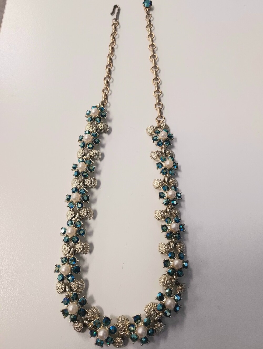 Gold-Tone Necklace with Teal Crystals and Pearl Accents